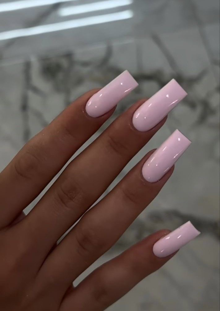 Glossy pink manicure with tiny heart details