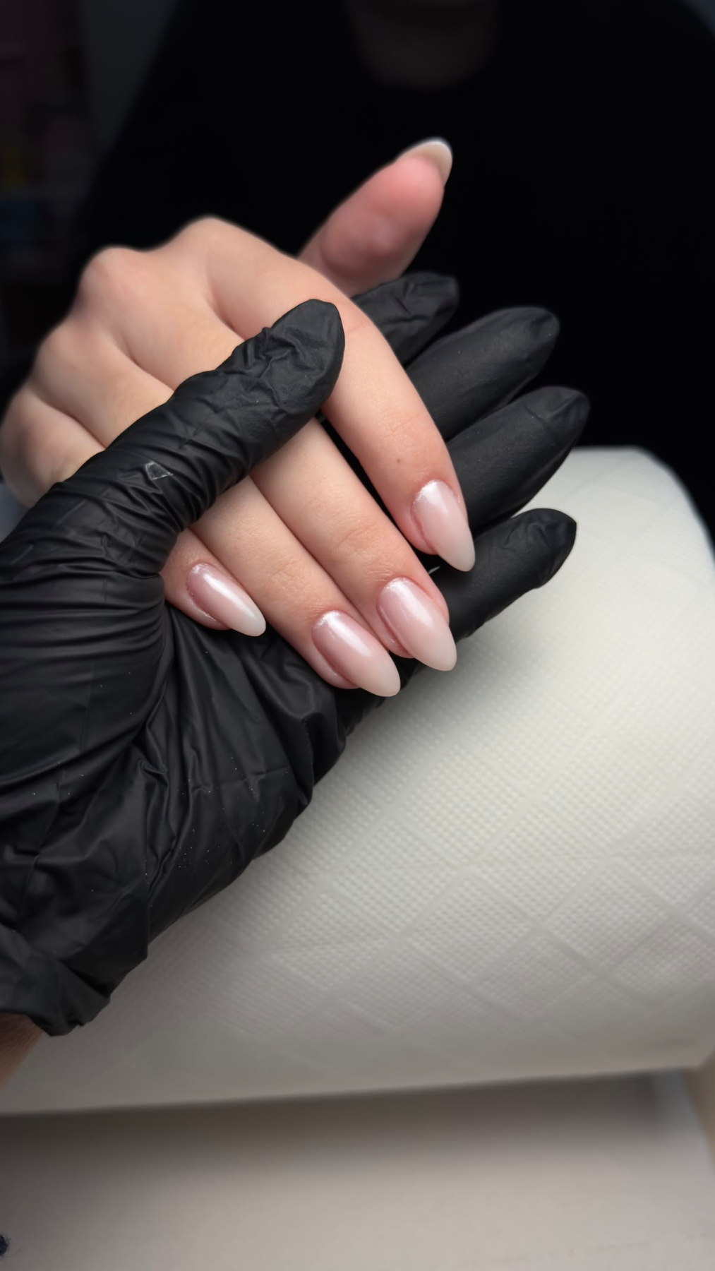 A calm manicure in progress at a clean cream table